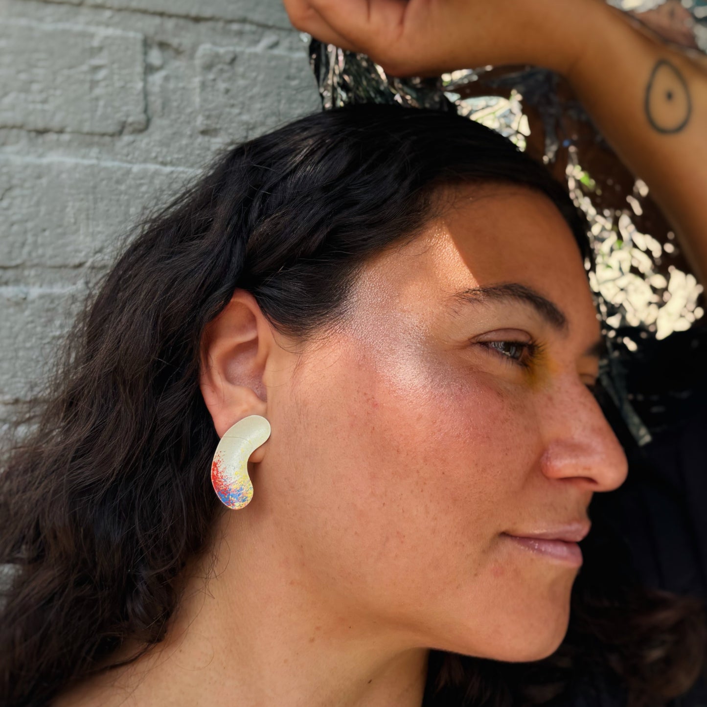 Vivid Bent Ellipse Satellite Earrings
